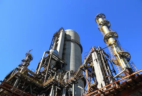 Manufacturing industry professionals using IT infrastructure on the factory floor
